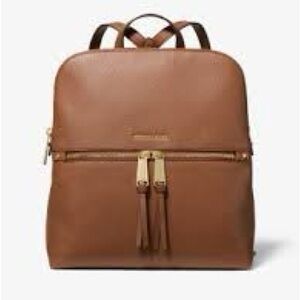 MK Rhea Medium Pebbled Slim Backpack